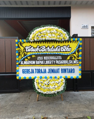 Papan Bunga Duka di Loji
